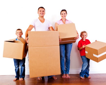 Professional team preparing office equipment for relocation in Storage Brompton