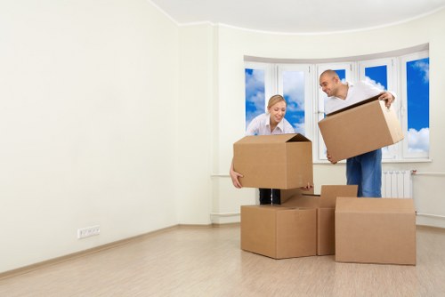 Professional packers handling belongings for a move in Brompton